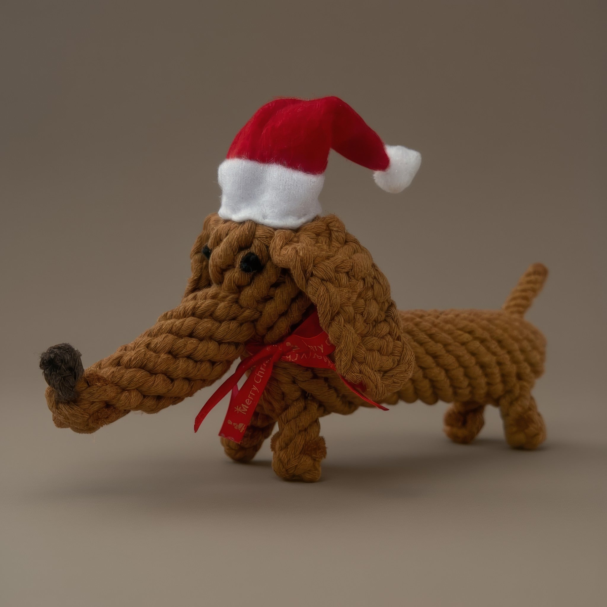 12814 - Santa Sausage mäyräkoiran muotoinen lelu - Muotitassu